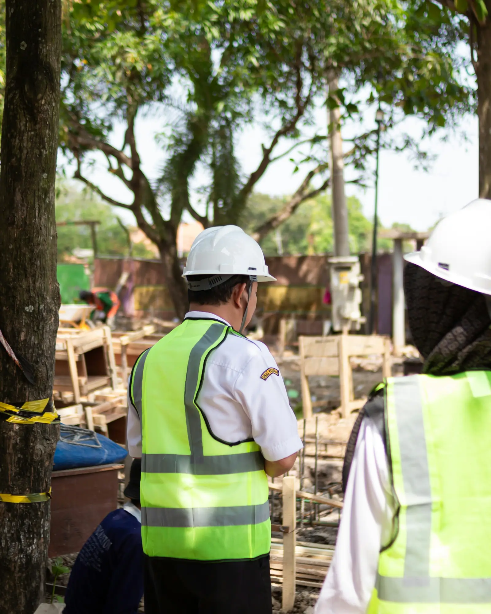 Representative Unsplash field team wearing construction safety equipment